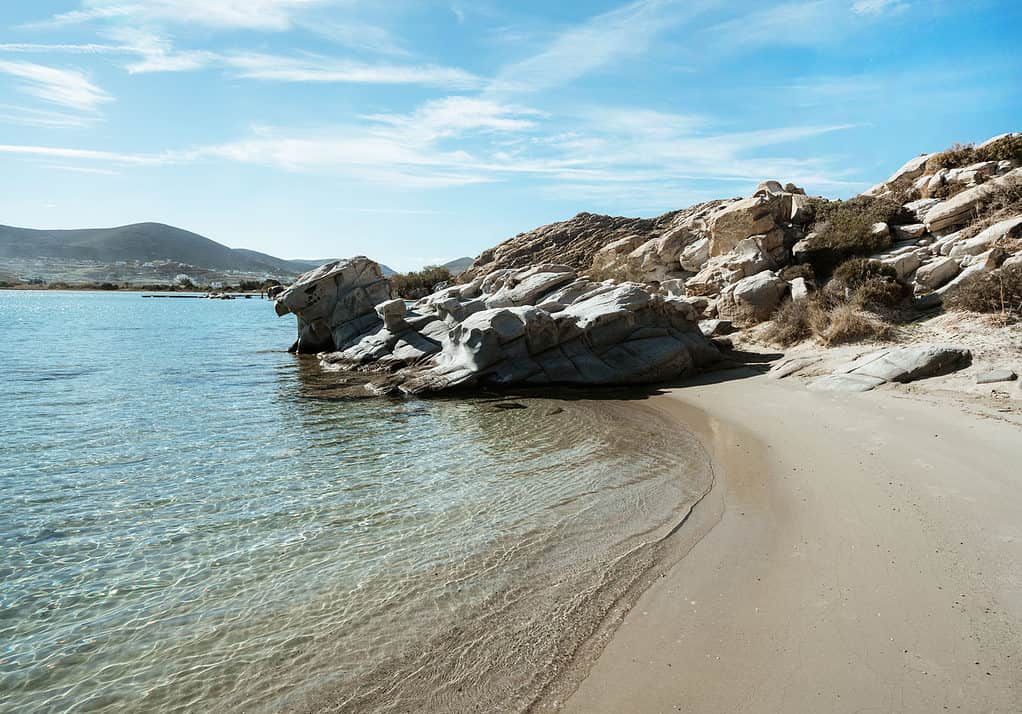 Clear water against the rocks in Kolymbithres Beach in Naoussa, Paros in Greece