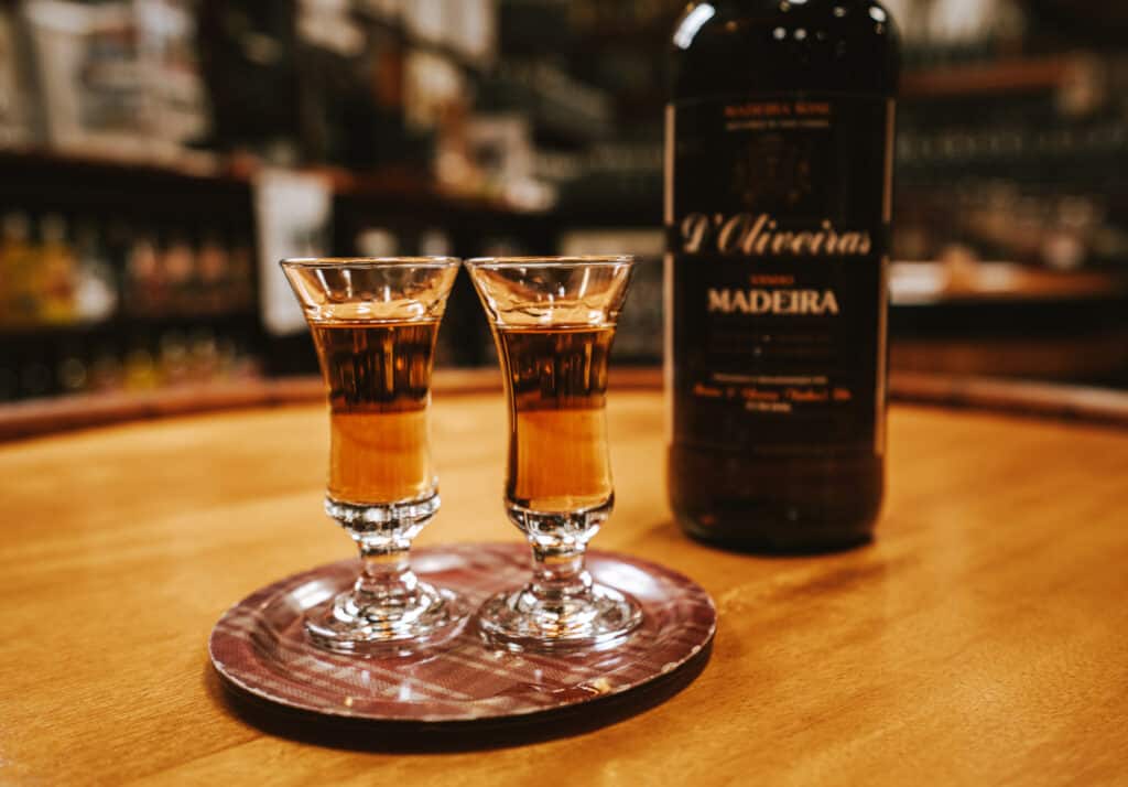 two small classes of wine for our wine-tasting in Pereira D'Oliveira, a famous Madeira winery in Funchal.